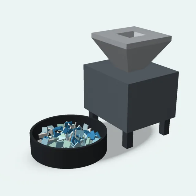 A granulator with a hopper dropping plastic flakes into a bin